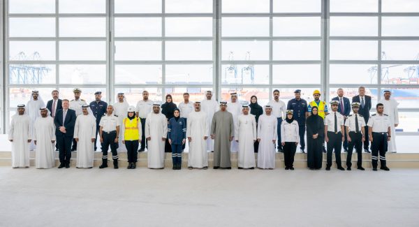 AL MA'MOURAH, ABU DHABI, UNITED ARAB EMIRATES - December 12, 2022: HH Sheikh Mohamed bin Zayed Al Nahyan, President of the United Arab Emirates (front row 8th R), stands for a photograph with Abu Dhabi Ports staff and management during the inauguration of the expansion of Khalifa Port, in Khalifa Industrial Zone (KIZAD). Seen with Captain Mohamed Juma Al Shamisi, Managing Director and Group CEO Of Abu Dhabi Ports (front row 6th R), HE Falah Mohamed Al Ahbabi, Abu Dhabi Executive Council Member and Chairman of the Department of Municipalities and Transport (front row 7th R) and HH Sheikh Khaled bin Mohamed bin Zayed Al Nahyan, Member of Abu Dhabi Executive Council and Chairman of Abu Dhabi Executive Office (front row 9th R).
( Rashed Al Mansoori /  UAE Presidential Court )
---